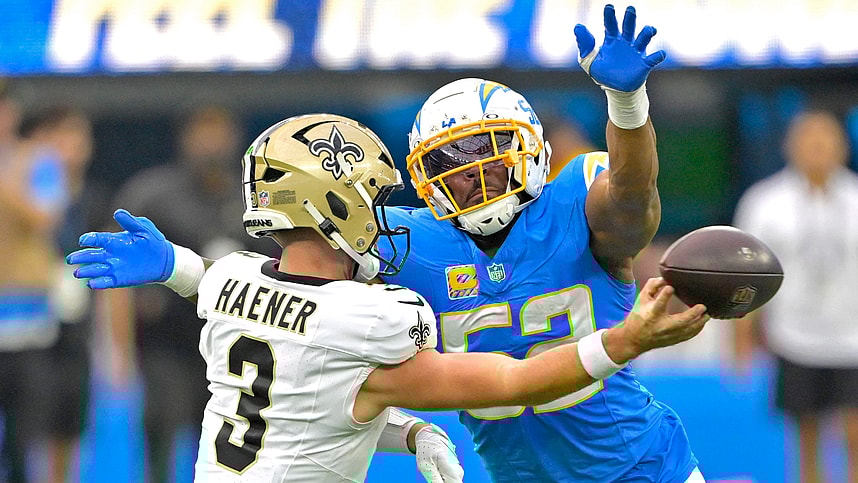 Oct 27, 2024; Inglewood, California, USA;  Los Angeles Chargers linebacker Khalil Mack (52) forces New Orleans Saints quarterback Jake Haener (3) to throw an incomplete pass in the second half at SoFi Stadium. Mandatory Credit: Jayne Kamin-Oncea-Imagn Images