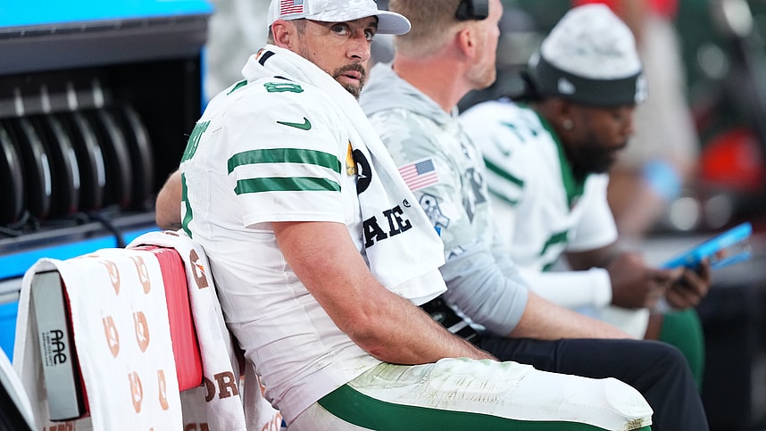 Nov 10, 2024; Glendale, Arizona, USA; New York Jets quarterback Aaron Rodgers (8) looks on against the Arizona Cardinals during the second half at State Farm Stadium. Mandatory Credit: Joe Camporeale-Imagn Images