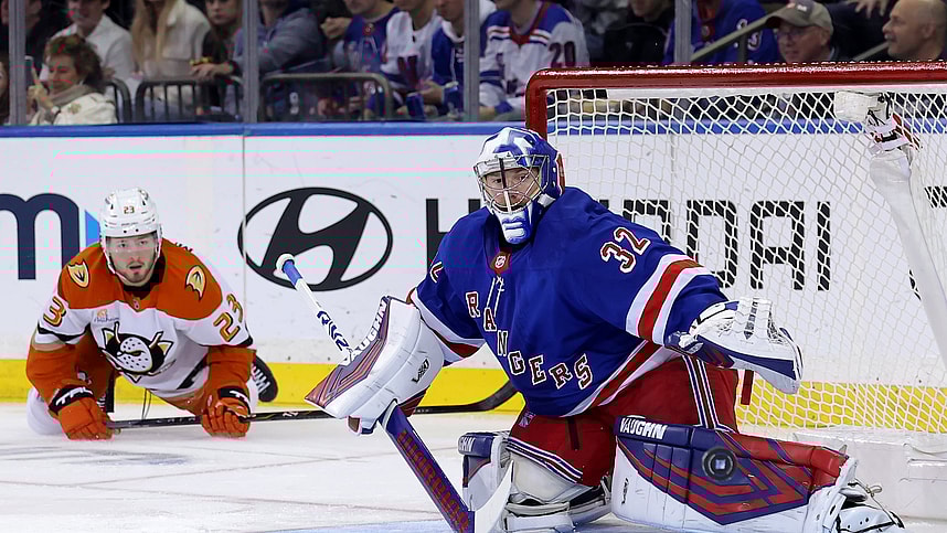 Oct 26, 2024; New York, New York, USA; New York Rangers goaltender Jonathan Quick (32) plays the puck against Anaheim Ducks center Mason McTavish (23) during the second period at Madison Square Garden. Mandatory Credit: Brad Penner-Imagn Images