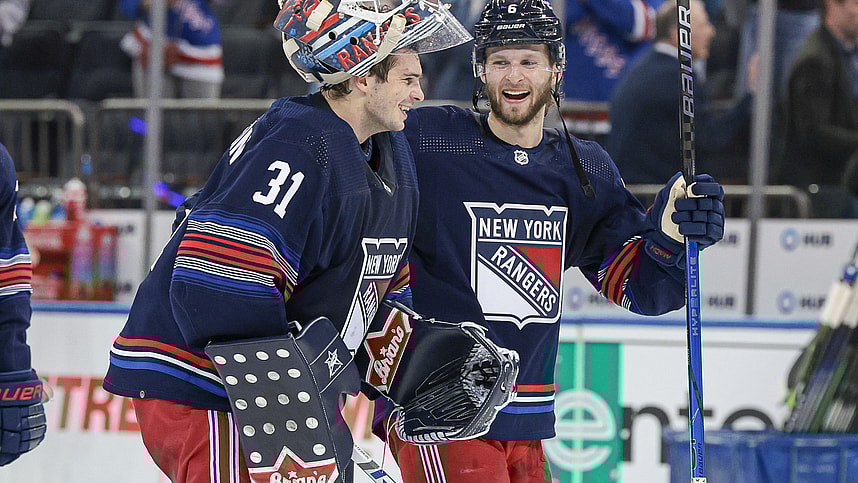 Mar 17, 2024; New York, New York, USA; New York Rangers defenseman Zac Jones (6) celebrates with goaltender Igor Shesterkin (31) after the game against the New York Islanders at Madison Square Garden. Mandatory Credit: Vincent Carchietta-Imagn Images