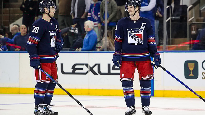 Nov 3, 2024; New York, New York, USA; New York Rangers defenseman Jacob Trouba (8) and left wing Chris Kreider (20) celebrate a win against the New York Islanders at Madison Square Garden. Mandatory Credit: Danny Wild-Imagn Images