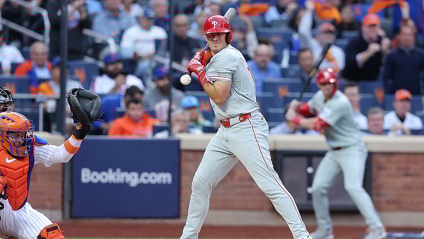 Oct 8, 2024; New York City, New York, USA; Philadelphia Phillies catcher J.T. Realmuto (10) is hit by a pitch in the second inning against the New York Mets during game three of the NLDS for the 2024 MLB Playoffs at Citi Field. Mandatory Credit: Brad Penner-Imagn Images