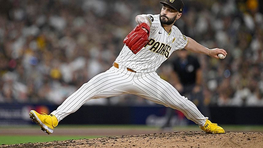 Oct 2, 2024; San Diego, California, USA; San Diego Padres pitcher Tanner Scott (66) throws during the sixth inning of game two in the Wildcard round for the 2024 MLB Playoffs against the Atlanta Braves at Petco Park. Mandatory Credit: Denis Poroy-Imagn Images