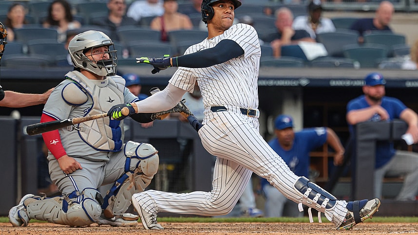 Aug 4, 2024; Bronx, New York, USA; New York Yankees right fielder Juan Soto (22) double during the eighth inning against the Toronto Blue Jays at Yankee Stadium. Mandatory Credit: Vincent Carchietta-Imagn Images