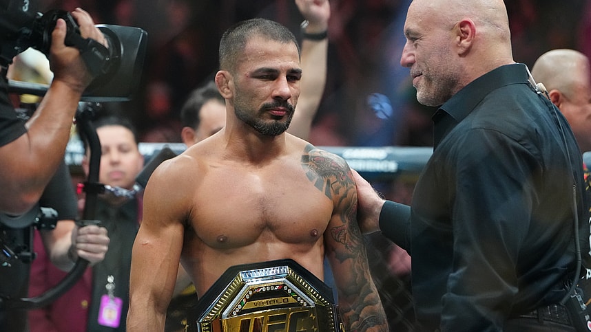 Dec 7, 2024; Las Vegas, Nevada, UNITED STATES; Alexandre Pantoja (red gloves) reacts after defeating Kai Asakura (blues gloves) at T-Mobile Arena. Mandatory Credit: Stephen R. Sylvanie-Imagn Images