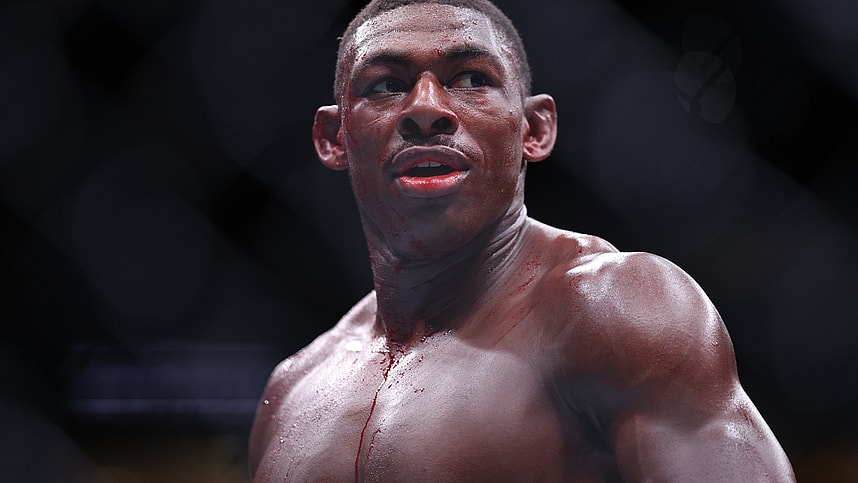 Dec 14, 2024; Tampa, Florida, UNITED STATES; Joaquin Buckley (blue gloves) reacts after the fight against Colby Covington (red gloves) at Amalie Arena. Mandatory Credit: Nathan Ray Seebeck-Imagn Images