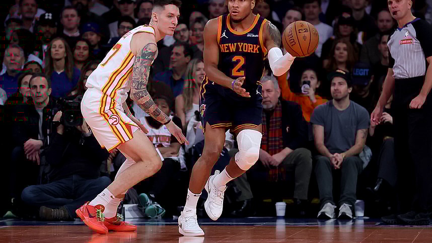 Dec 11, 2024; New York, New York, USA; New York Knicks guard Miles McBride (2) looks to pass the ball against Atlanta Hawks guard Vit Krejci (27) during the second quarter at Madison Square Garden. Mandatory Credit: Brad Penner-Imagn Images