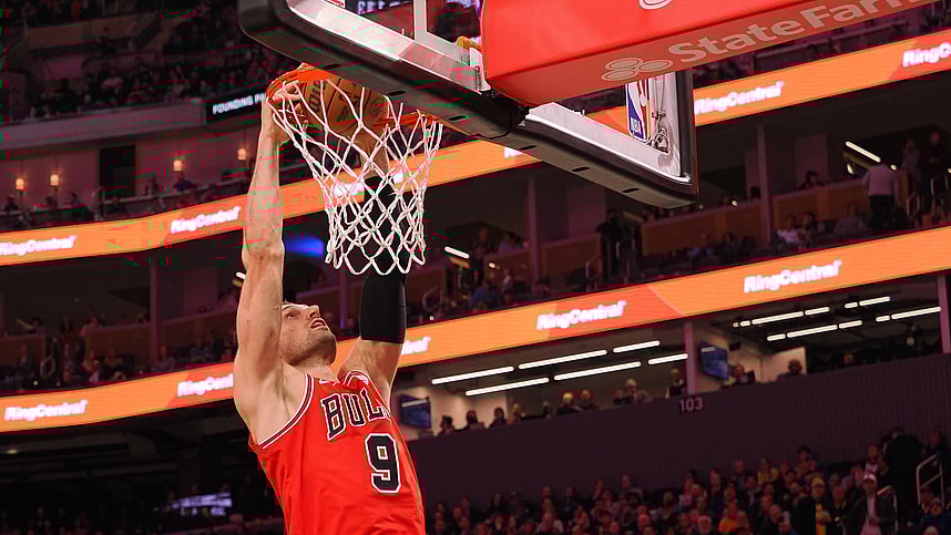 Mar 7, 2024; San Francisco, California, USA; Chicago Bulls center Nikola Vucevic (9) dunks the ball against the Golden State Warriors during the third quarter at Chase Center. Mandatory Credit: Kelley L Cox-Imagn Images