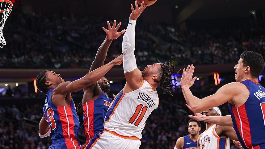 Dec 7, 2024; New York, New York, USA; New York Knicks guard Jalen Brunson (11) shoots the ball as Detroit Pistons guard Jaden Ivey (23) defends during the second half at Madison Square Garden. Mandatory Credit: Vincent Carchietta-Imagn Images