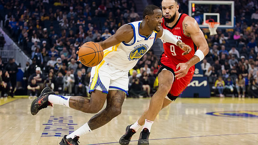 Dec 5, 2024; San Francisco, California, USA;  Golden State Warriors forward Jonathan Kuminga (00) drives past Houston Rockets forward Dillon Brooks (9) during the first quarter at Chase Center. Mandatory Credit: John Hefti-Imagn Images