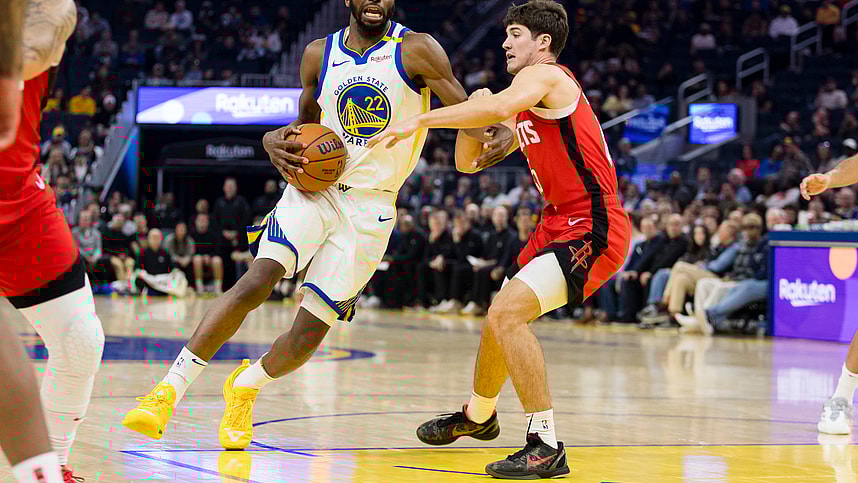 Dec 5, 2024; San Francisco, California, USA; Houston Rockets guard Reed Sheppard (15) defends against Golden State Warriors forward Andrew Wiggins (22) during the first quarter at Chase Center. Mandatory Credit: John Hefti-Imagn Images