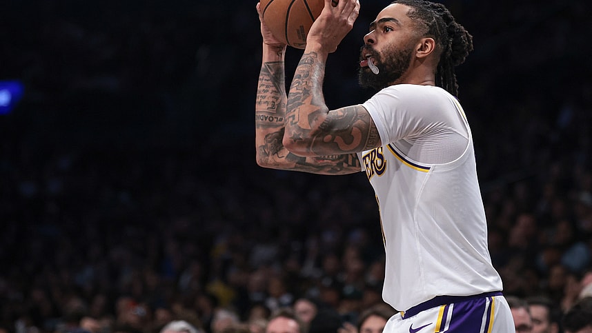 Mar 31, 2024; Brooklyn, New York, USA; Los Angeles Lakers guard D'Angelo Russell (1) shoots during the second half against the Brooklyn Nets at Barclays Center. Mandatory Credit: Vincent Carchietta-Imagn Images