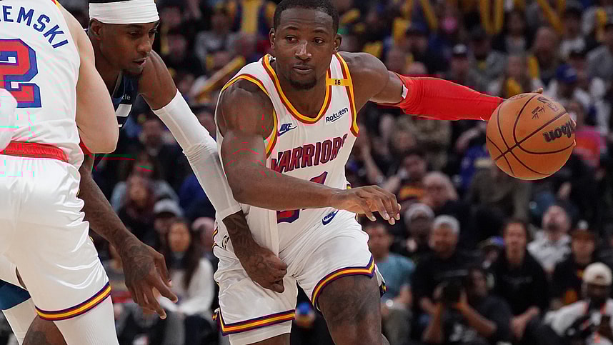 Dec 8, 2024; San Francisco, California, USA; Golden State Warriors forward Jonathan Kuminga (00) dribbles by Minnesota Timberwolves forward Jaden McDaniels (3) in the fourth period at Chase Center. Mandatory Credit: David Gonzales-Imagn Images