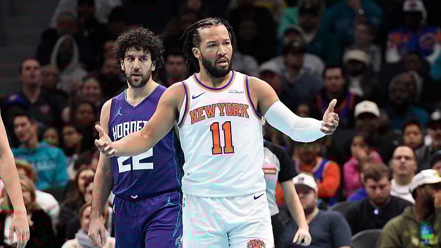 Nov 29, 2024; Charlotte, North Carolina, USA; New York Knicks guard Jalen Brunson (11) complains about a possible foul during the second half against the Charlotte Hornets at the Spectrum Center. Mandatory Credit: Sam Sharpe-Imagn Images