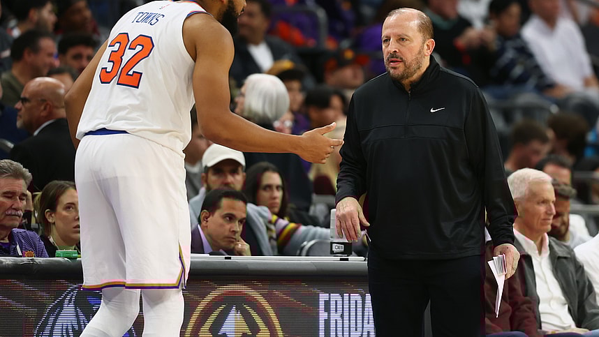 Nov 20, 2024; Phoenix, Arizona, USA; New York Knicks head coach Tom Thibodeau with center Karl-Anthony Towns (32) against the Phoenix Suns at Footprint Center. Mandatory Credit: Mark J. Rebilas-Imagn Images