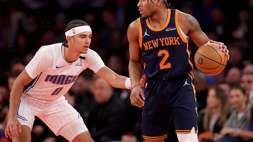 Dec 3, 2024; New York, New York, USA; New York Knicks guard Miles McBride (2) controls the ball against Orlando Magic guard Anthony Black (0) during the first quarter at Madison Square Garden. Mandatory Credit: Brad Penner-Imagn Images