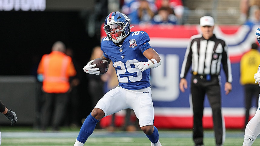 Dec 29, 2024; East Rutherford, New Jersey, USA; New York Giants running back Tyrone Tracy Jr. (29) carries the ball during the first half against the Indianapolis Colts at MetLife Stadium. Mandatory Credit: Vincent Carchietta-Imagn Images