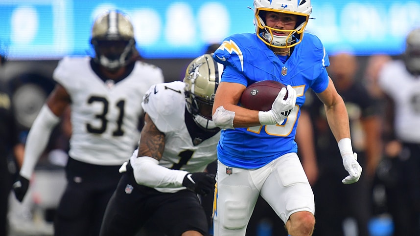 Oct 27, 2024; Inglewood, California, USA; Los Angeles Chargers wide receiver Ladd McConkey (15) runs the ball for a touchdown against the New Orleans Saints during the second half at SoFi Stadium. Mandatory Credit: Gary A. Vasquez-Imagn Images
