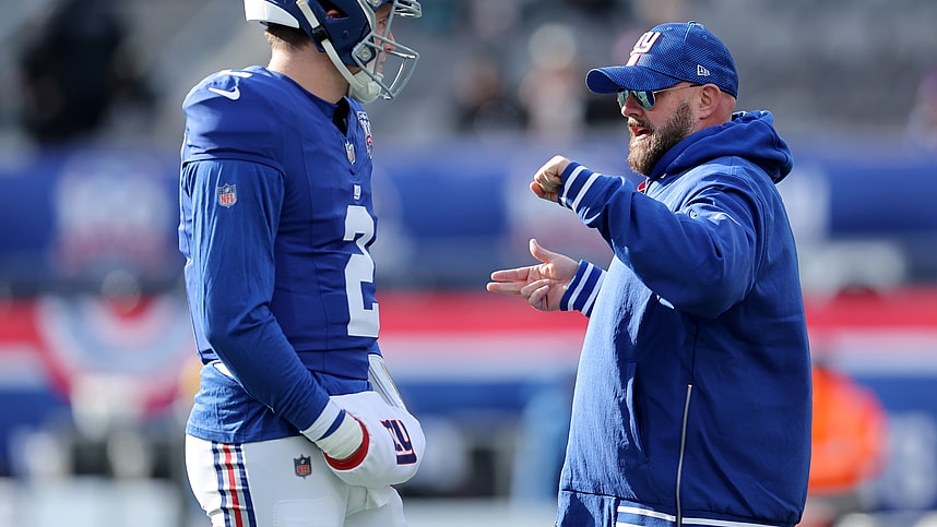 Dec 8, 2024; East Rutherford, New Jersey, USA; New York Giants head coach Brian Daboll talks to quarterback Drew Lock (2) before a game against the New Orleans Saints at MetLife Stadium. Mandatory Credit: Brad Penner-Imagn Images