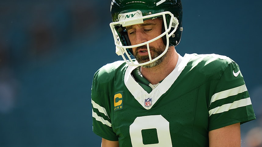 Dec 8, 2024; Miami Gardens, Florida, USA; New York Jets quarterback Aaron Rodgers (8) warms up prior to the game against the Miami Dolphins at Hard Rock Stadium. Mandatory Credit: Jasen Vinlove-Imagn Images