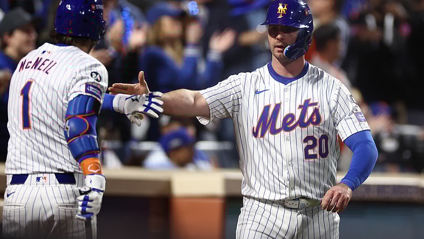 Oct 18, 2024; New York City, New York, USA; New York Mets first baseman Pete Alonso (20) celebrates scoring on an RBI from right fielder Starling Marte (6, not pictured) with New York Mets second baseman Jeff McNeil (1) during the eighth inning against the Los Angeles Dodgers during game five of the NLCS for the 2024 MLB playoffs at Citi Field. Mandatory Credit: Vincent Carchietta-Imagn Images