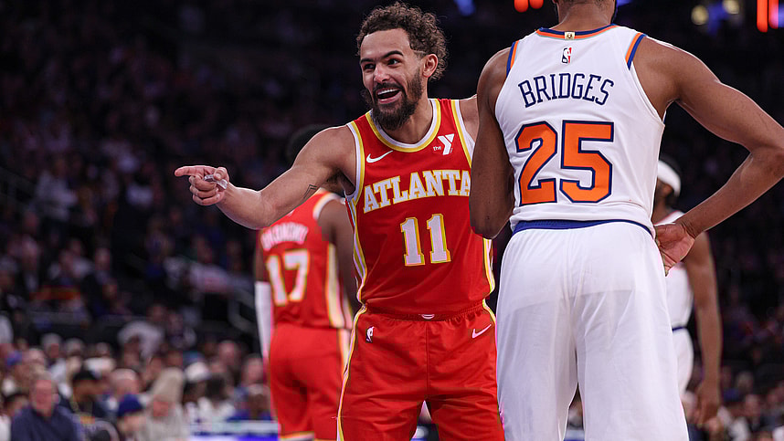 Jan 20, 2025; New York, New York, USA; Atlanta Hawks guard Trae Young (11) reacts in front of New York Knicks forward Mikal Bridges (25) during the first half at Madison Square Garden. Mandatory Credit: Vincent Carchietta-Imagn Images