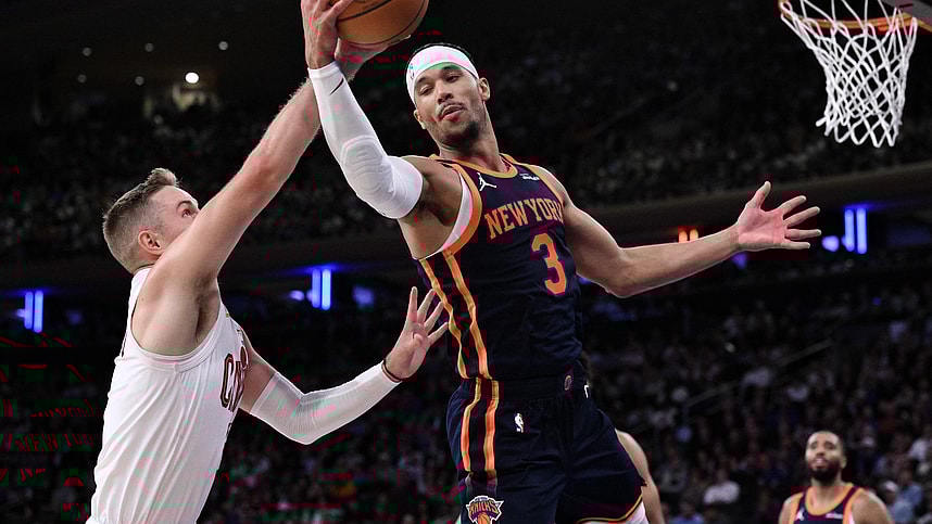 Oct 28, 2024; New York, New York, USA; New York Knicks guard Josh Hart (3) grabs a rebound against Cleveland Cavaliers guard Sam Merrill (5) during the second half at Madison Square Garden. Mandatory Credit: John Jones-Imagn Images