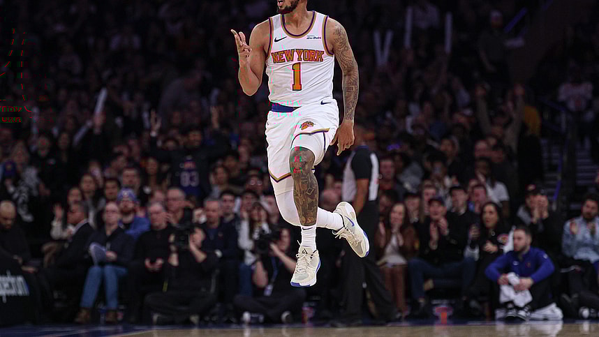 Jan 1, 2025; New York, New York, USA; New York Knicks guard Cameron Payne (1) reacts after a three point basket during the first half against the Utah Jazz at Madison Square Garden. Mandatory Credit: Vincent Carchietta-Imagn Images