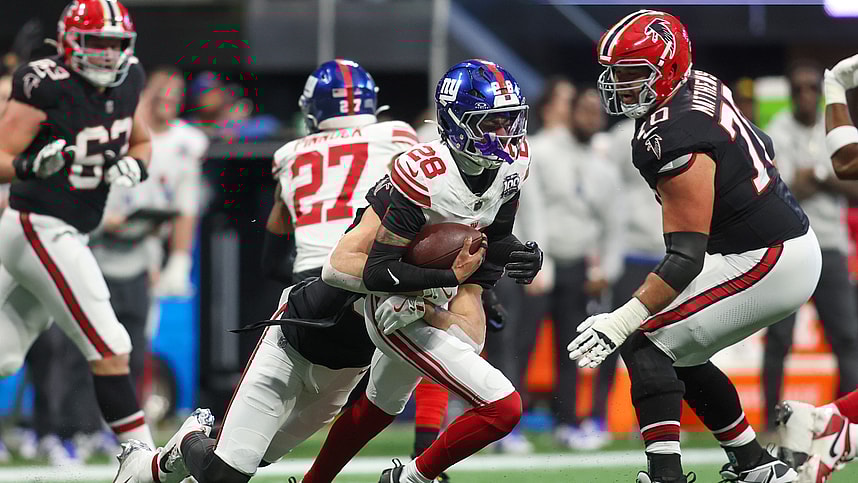 Dec 22, 2024; Atlanta, Georgia, USA; New York Giants cornerback Cor'Dale Flott (28) returns an interception against the Atlanta Falcons in the second quarter at Mercedes-Benz Stadium. Mandatory Credit: Brett Davis-Imagn Images