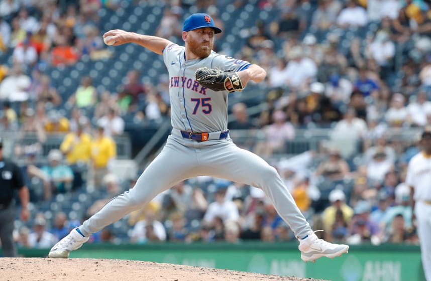 Jul 7, 2024; Pittsburgh, Pennsylvania, USA; New York Mets pitcher Reed Garrett (75) pitches against the Pittsburgh Pirates during the seventh inning at PNC Park. The Mets won 3-2. Mandatory Credit: Charles LeClaire-USA TODAY Sports
