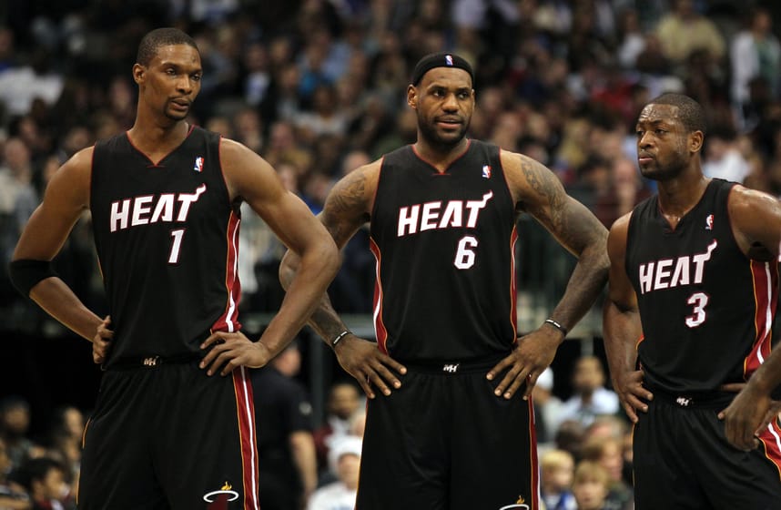 Nov 27, 2010; Dallas, TX, USA; Miami Heat forward Chris Bosh (1) Lebron James (6) guard Dwyane Wade during a break in the action from the game against the Dallas Mavericks at American Airlines Center. The Mavs beat the Heat 106-95. Mandatory Credit: Matthew Emmons-Imagn Images