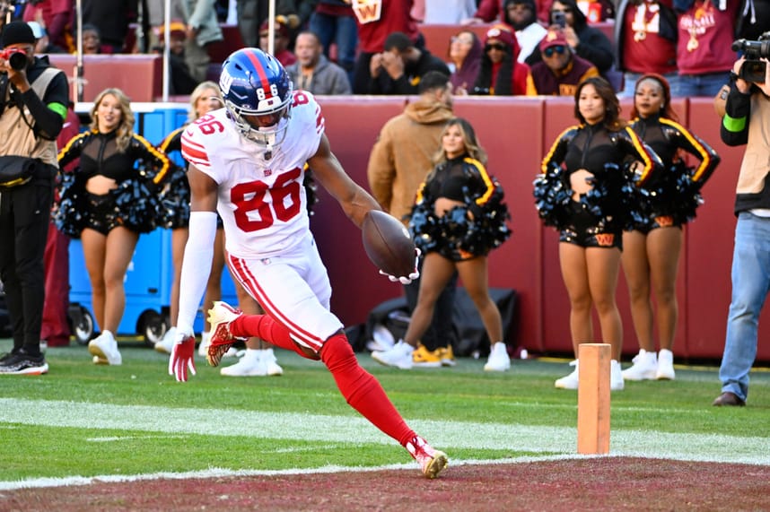 New York Giants wide receiver Darius Slayton (86) scores a touchdown against the Washington Commanders during the first half at FedExField