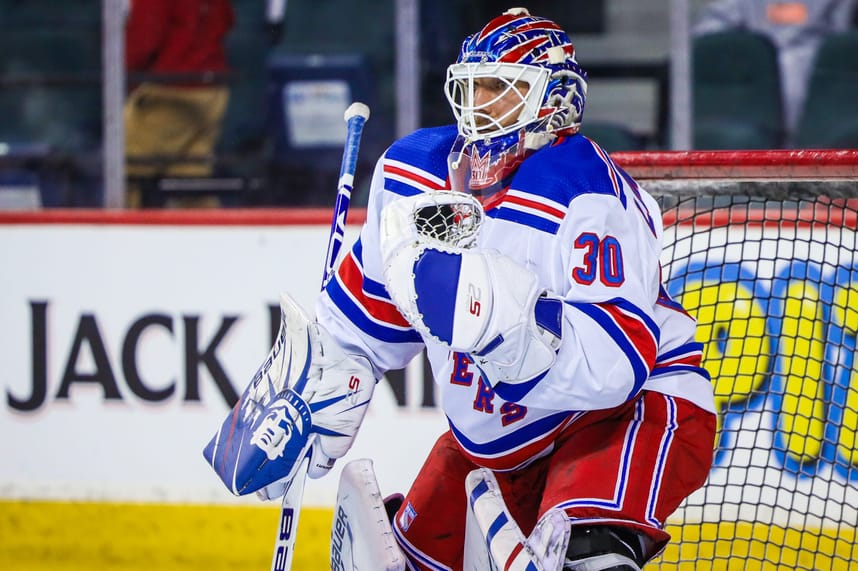 New York Rangers goaltender Henrik Lundqvist (30) guards his net during the warmup period before a game against the Calgary Flames at Scotiabank Saddledome