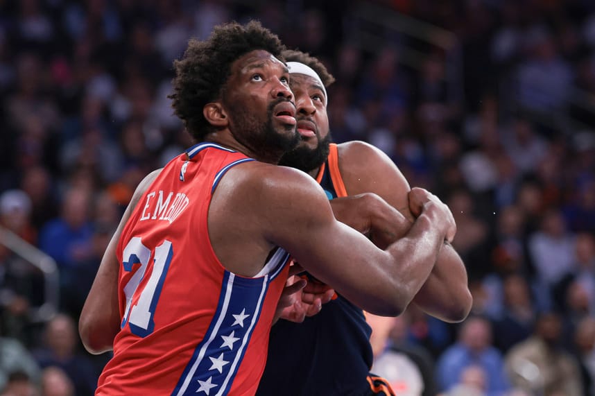 Apr 22, 2024; New York, New York, USA; Philadelphia 76ers center Joel Embiid (21) battles for position against New York Knicks center Mitchell Robinson (23) during the second half during game two of the first round for the 2024 NBA playoffs at Madison Square Garden. Mandatory Credit: Vincent Carchietta-USA TODAY Sports