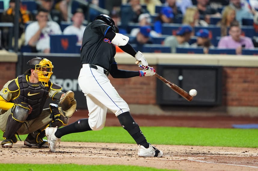 Jun 14, 2024; New York City, New York, USA; New York Mets left fielder Brandon Nimmo (9) hits a single against the San Diego Padres during the third inning at Citi Field. Mandatory Credit: Gregory Fisher-USA TODAY Sports