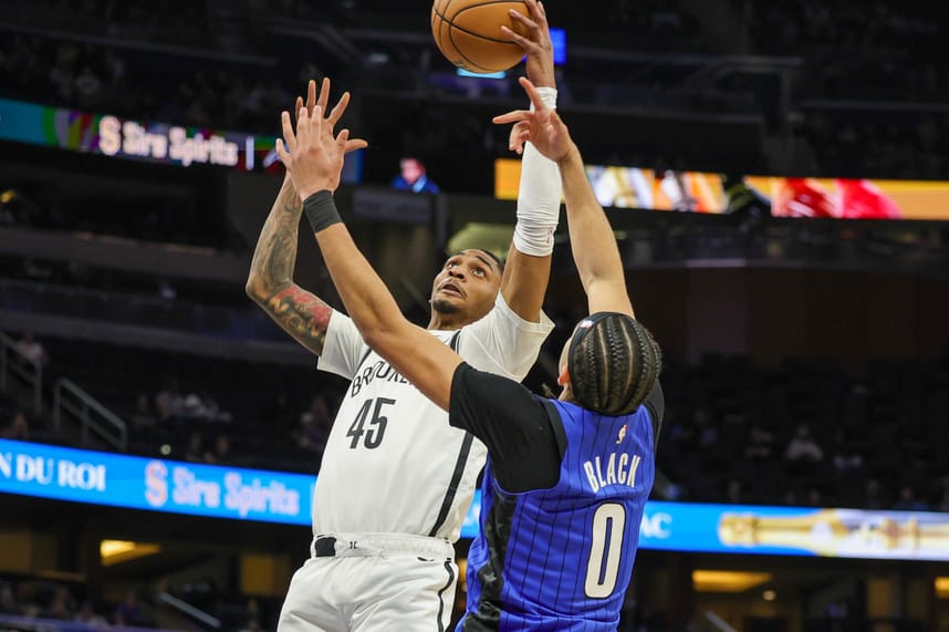 Feb 27, 2024; Orlando, Florida, USA; Brooklyn Nets guard Keon Johnson (45) goes to the basket against Orlando Magic guard Anthony Black (0) during the second half at Amway Center. Mandatory Credit: Mike Watters-USA TODAY Sports