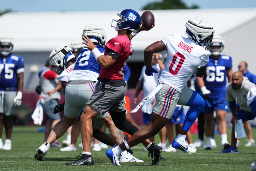 Jul 26, 2024; East Rutherford, NJ, USA; New York Giants quarterback Daniel Jones (8) passes during training camp at Quest Diagnostics Training Center. Mandatory Credit: Lucas Boland-USA TODAY Sports