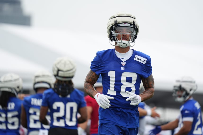 Jul 25, 2024; East Rutherford, NY, USA; New York Giants wide receiver Isaiah Hodgins (18) jogs onto the field during training camp at Quest Diagnostics Training Center. Mandatory Credit: Lucas Boland-USA TODAY Sports