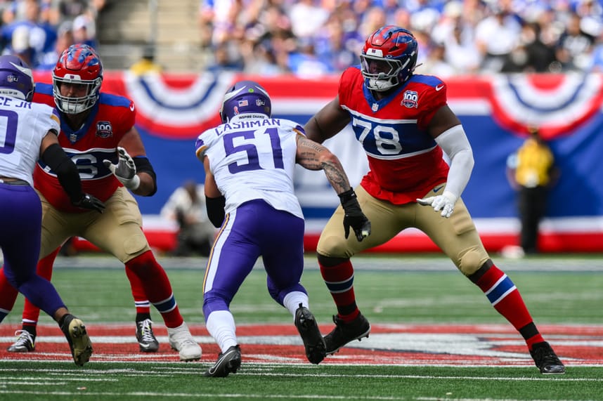 Sep 8, 2024; East Rutherford, New Jersey, USA; New York Giants offensive tackle Andrew Thomas (78) pass protects against Minnesota Vikings linebacker Blake Cashman (51) during the second half at MetLife Stadium. Mandatory Credit: John Jones-Imagn Images