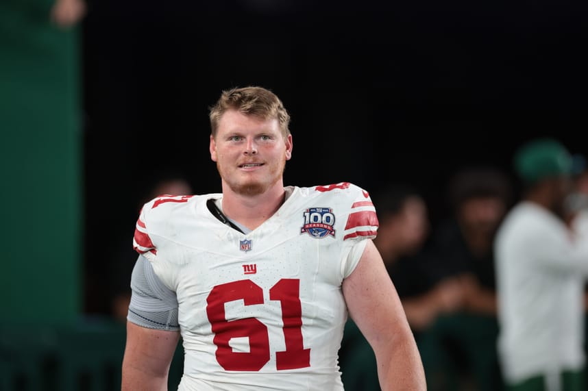 Aug 24, 2024; East Rutherford, New Jersey, USA; New York Giants center John Michael Schmitz Jr. (61) after the game at MetLife Stadium. Mandatory Credit: Vincent Carchietta-Imagn Images