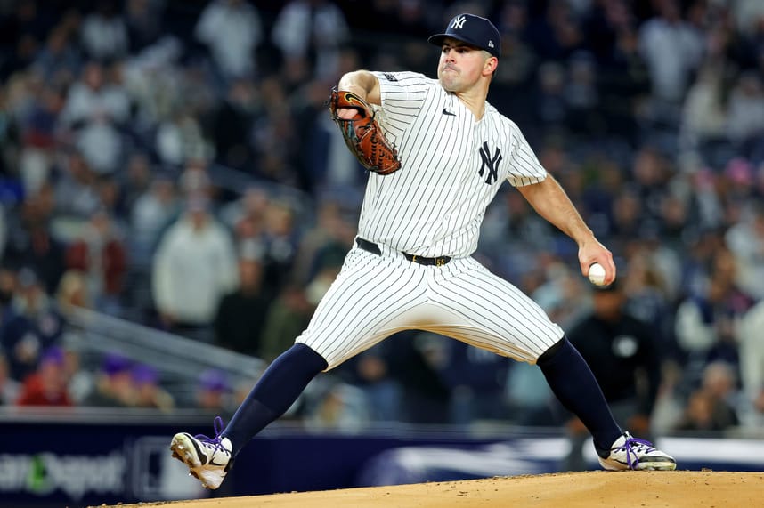 Oct 14, 2024; Bronx, New York, USA; New York Yankees pitcher Carlos Rodon (55) pitches during the first inning against the Cleveland Guardians in game one of the ALCS for the 2024 MLB Playoffs at Yankee Stadium. Mandatory Credit: Brad Penner-Imagn Images