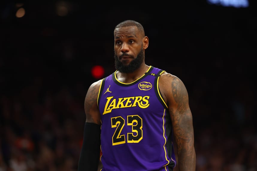 Oct 28, 2024; Phoenix, Arizona, USA; Los Angeles Lakers forward LeBron James (23) against the Phoenix Suns at Footprint Center. Mandatory Credit: Mark J. Rebilas-Imagn Images