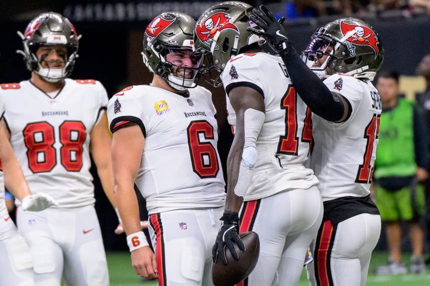 Oct 13, 2024; New Orleans, Louisiana, USA; Tampa Bay Buccaneers quarterback Baker Mayfield (6) celebrates the touchdown reception of Tampa Bay Buccaneers wide receiver Chris Godwin (14) during the first quarter against the New Orleans Saints at Caesars Superdome. Mandatory Credit: Matthew Hinton-Imagn Images