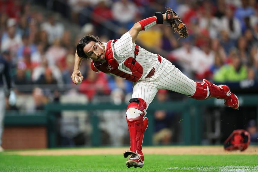 Sep 9, 2024; Philadelphia, Pennsylvania, USA; Philadelphia Phillies catcher Garrett Stubbs (21) fields a ball Tampa Bay Rays at Citizens Bank Park. Mandatory Credit: Bill Streicher-Imagn Images