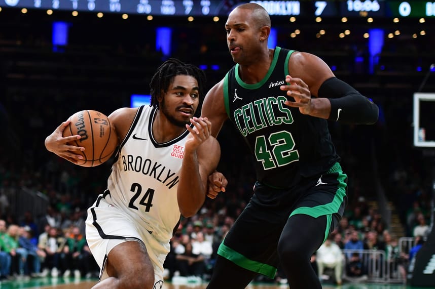 Nov 8, 2024; Boston, Massachusetts, USA;  Brooklyn Nets guard Cam Thomas (24) controls the ball while Boston Celtics center Al Horford (42) defends during the first half at TD Garden. Mandatory Credit: Bob DeChiara-Imagn Images