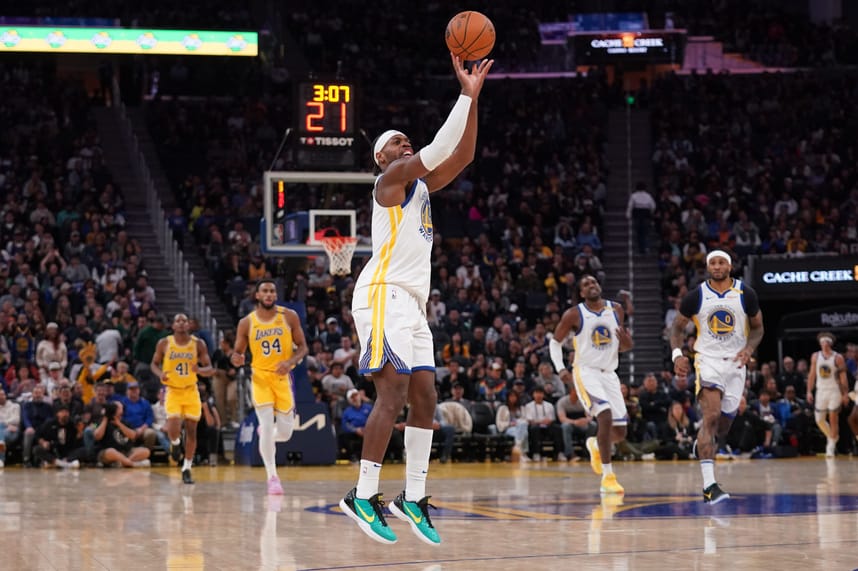 Oct 18, 2024; San Francisco, California, USA; Golden State Warriors guard Buddy Hield (7) shoots the ball against the Los Angeles Lakers in the third quarter at the Chase Center. Mandatory Credit: Cary Edmondson-Imagn Images