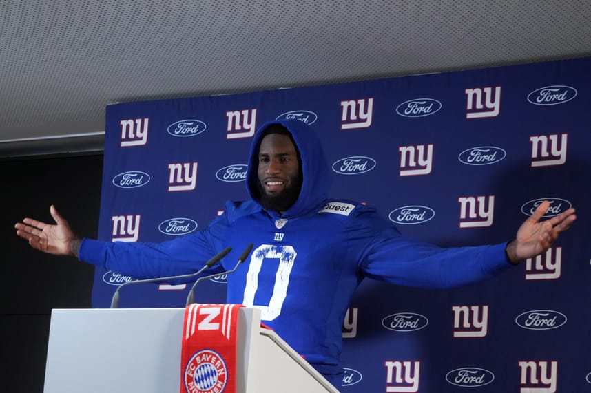 Nov 8, 2024; Munich, Germany; New York Giants linebacker Brian Burns (0) during press conference at the FC Bayern Munchen training grounds at Sabener Strasse.  Mandatory Credit: Kirby Lee-Imagn Images