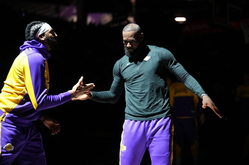 Dec 19, 2024; Sacramento, California, USA; Los Angeles Lakers forward LeBron James (23) meets with forward Anthony Davis (3) before the start of the game against the Sacramento Kings at the Golden 1 Center. Mandatory Credit: Cary Edmondson-Imagn Images