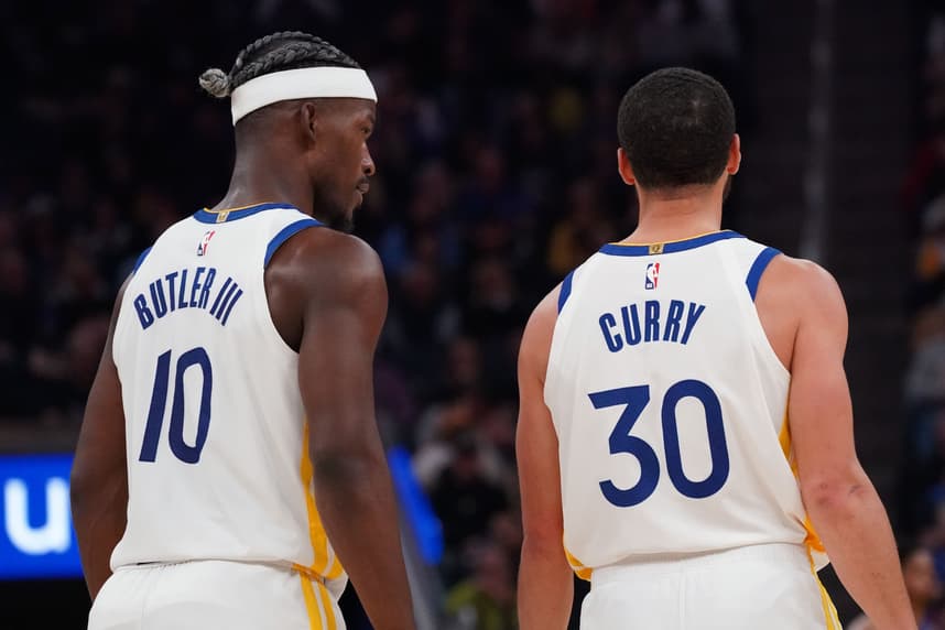 Mar 8, 2025; San Francisco, California, USA; Golden State Warriors forward Jimmy Butler III (10) talks with guard Stephen Curry (30) during a game against the Detroit Pistons in the second quarter at Chase Center. Mandatory Credit: David Gonzales-Imagn Images