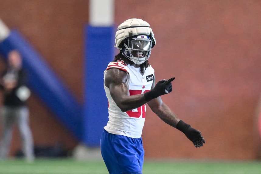 Arvell Reese works through Giants organized team activities